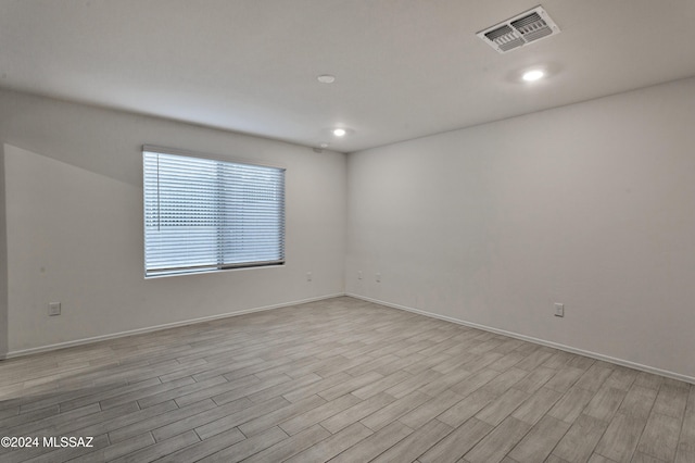 empty room featuring light hardwood / wood-style floors