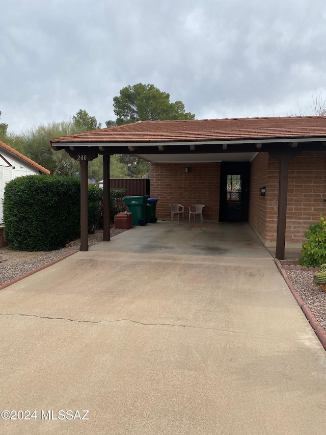 view of parking featuring a carport