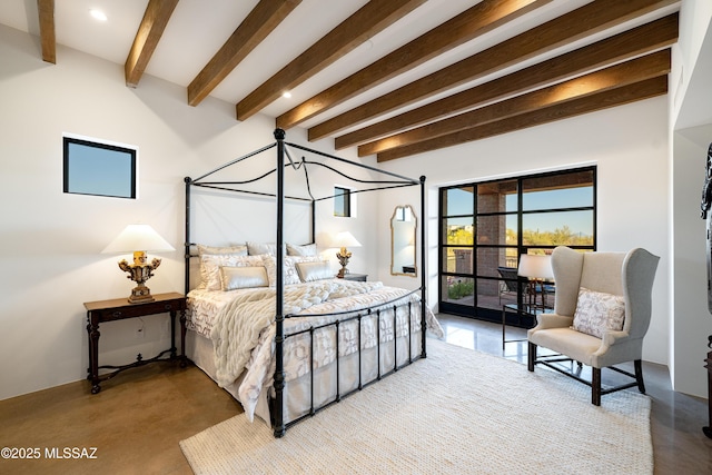 5200 N Camino Antonio, Tucson, AZ 85718 - bedroom with beam ceiling and concrete flooring