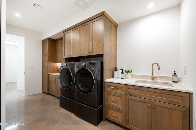 5200 N Camino Antonio, Tucson, AZ 85718 - laundry room with washer and clothes dryer, cabinet space, recessed lighting, and a sink
