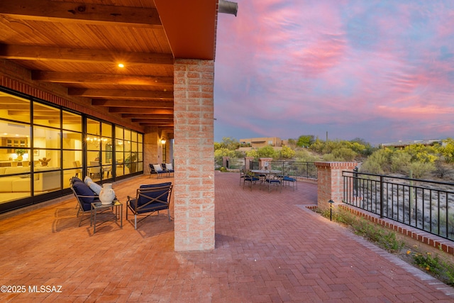 5200 N Camino Antonio, Tucson, AZ 85718 - patio terrace at dusk with outdoor dining space