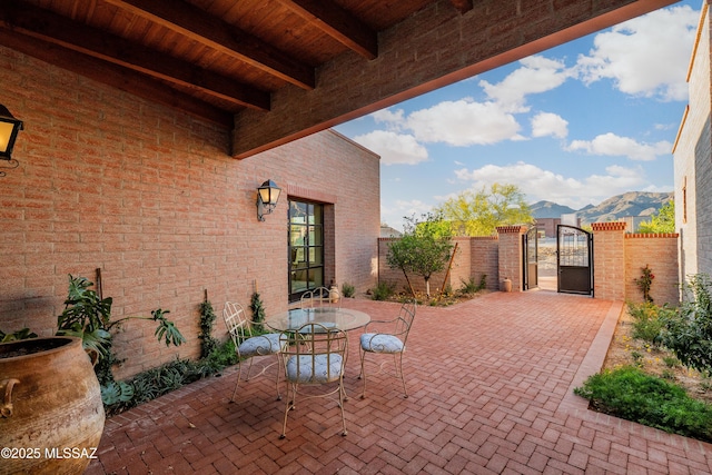 5200 N Camino Antonio, Tucson, AZ 85718 - view of patio with a mountain view, fence private yard, and a gate