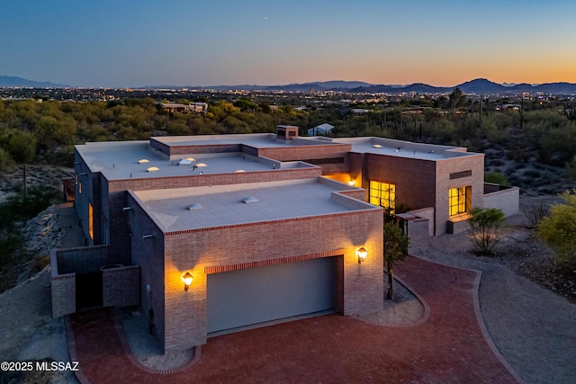 5200 N Camino Antonio, Tucson, AZ 85718 - view of front facade featuring driveway, a mountain view, and a garage