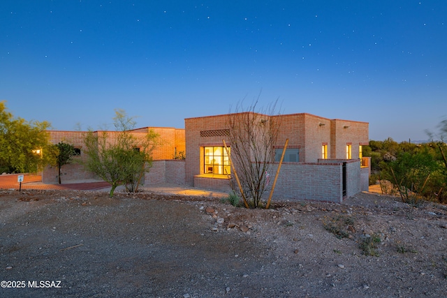 5200 N Camino Antonio, Tucson, AZ 85718 - adobe home with brick siding