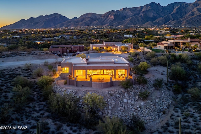 5200 N Camino Antonio, Tucson, AZ 85718 - aerial view at dusk featuring a mountain view