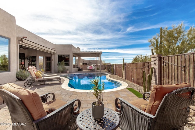 view of pool with a patio area