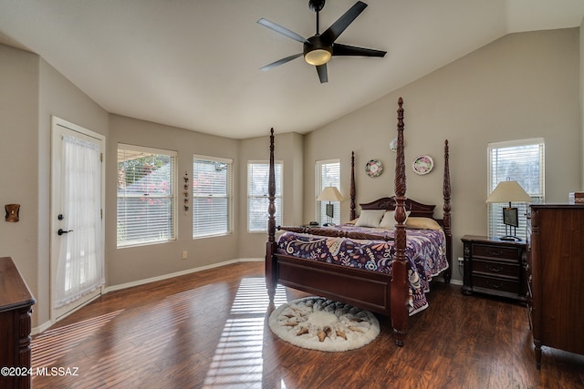 bedroom with dark hardwood / wood-style floors, ceiling fan, and multiple windows