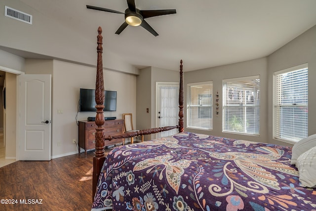 bedroom featuring ceiling fan and dark wood-type flooring