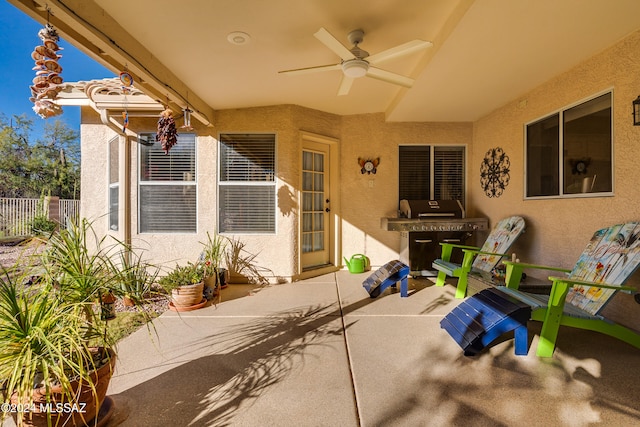 view of patio featuring ceiling fan and area for grilling