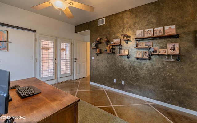 office area featuring ceiling fan, visible vents, french doors, and tile patterned floors