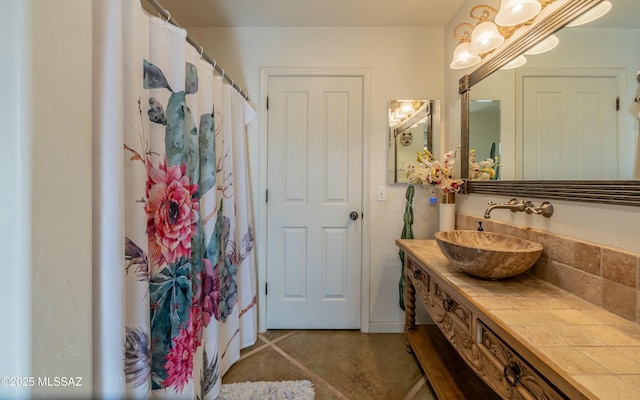 full bath featuring vanity and a shower with shower curtain