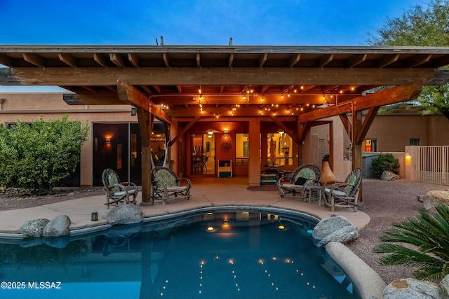 pool with a patio area