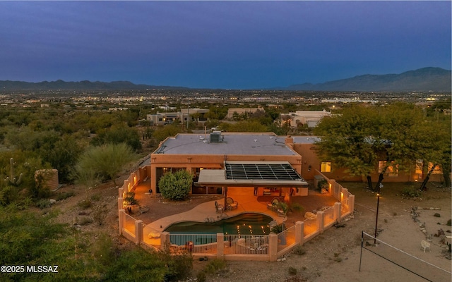 drone / aerial view featuring a mountain view