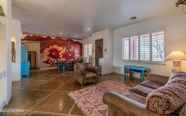 tiled living area with recessed lighting, visible vents, and baseboards