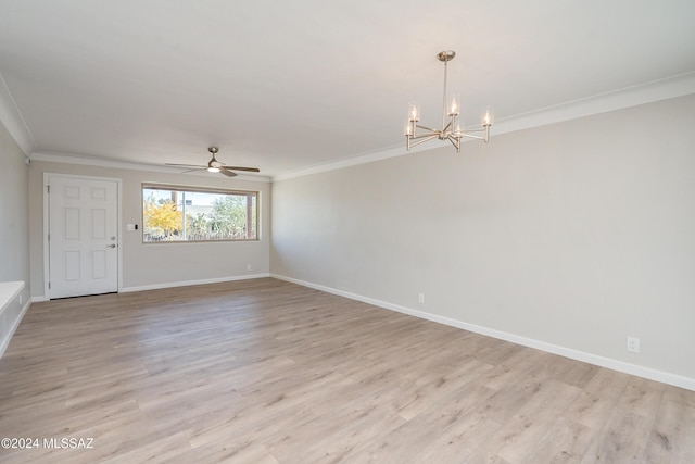 unfurnished room featuring crown molding, ceiling fan with notable chandelier, and light hardwood / wood-style flooring