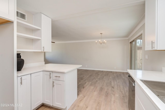 kitchen with hanging light fixtures, white cabinets, stainless steel dishwasher, kitchen peninsula, and light wood-type flooring