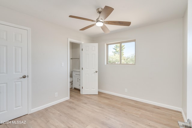 unfurnished bedroom with light hardwood / wood-style flooring and ceiling fan