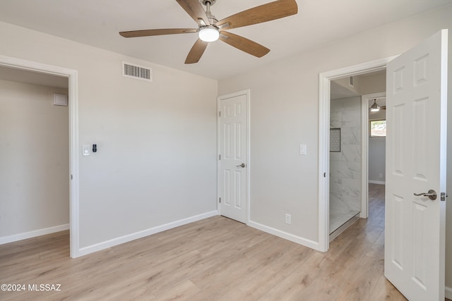 unfurnished bedroom featuring ceiling fan and light hardwood / wood-style floors