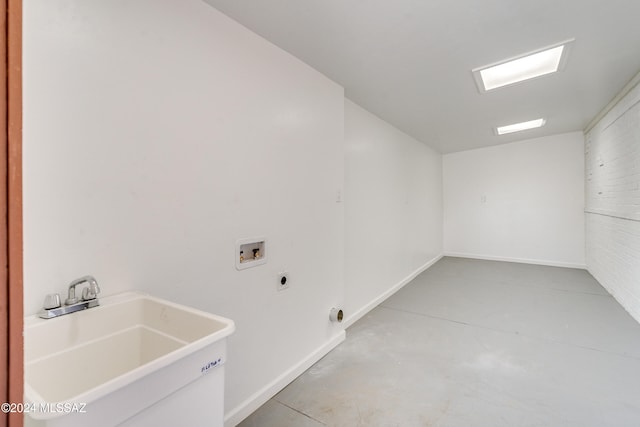 laundry area with sink, hookup for a washing machine, and hookup for an electric dryer