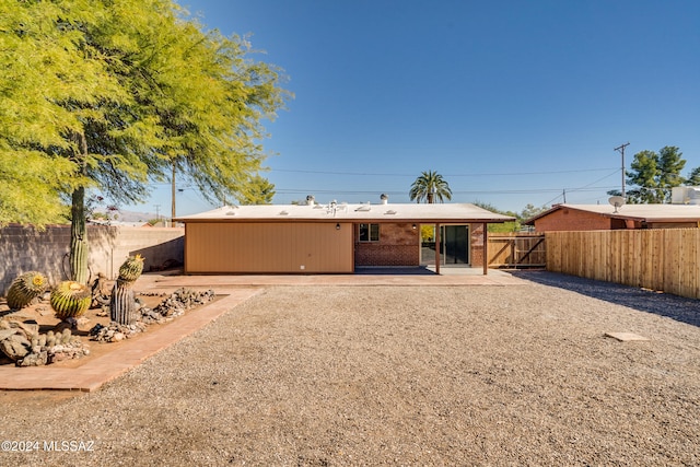 rear view of house featuring a patio area