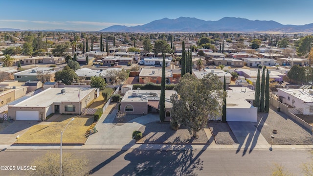 drone / aerial view featuring a mountain view