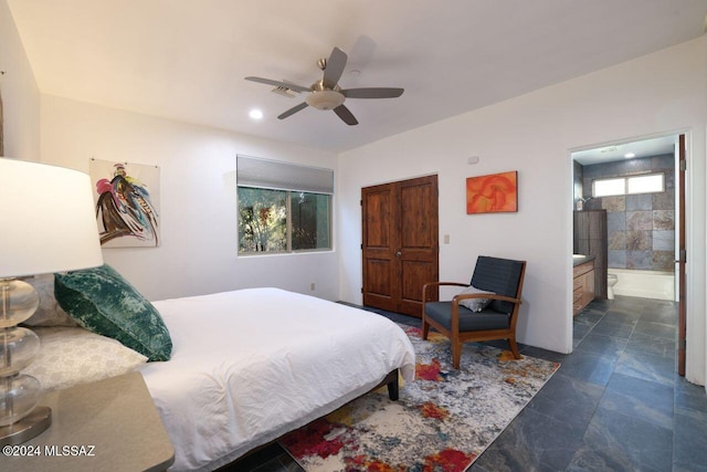 bedroom featuring ensuite bath and ceiling fan