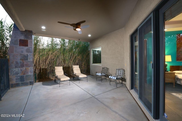 view of patio with ceiling fan