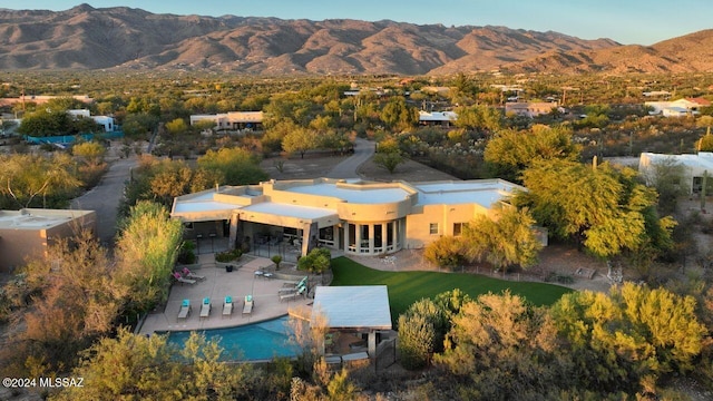 bird's eye view with a mountain view