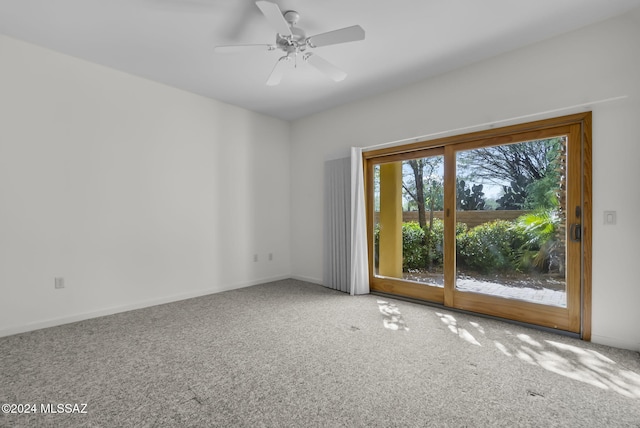 unfurnished room with carpet floors and ceiling fan