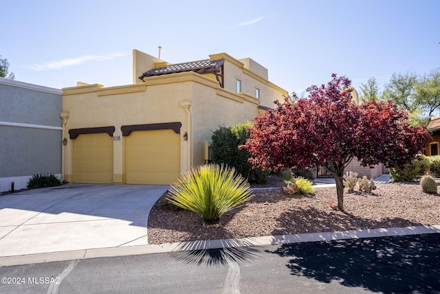 view of front of home with a garage