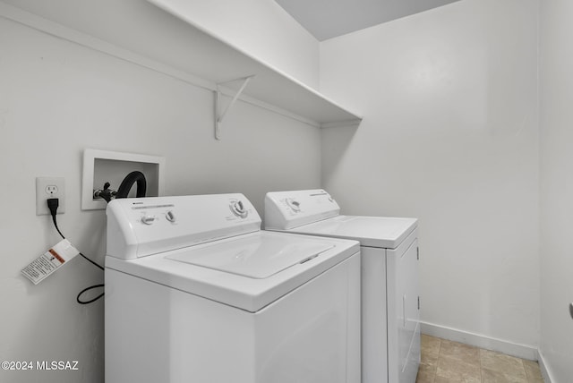 laundry room with washing machine and dryer