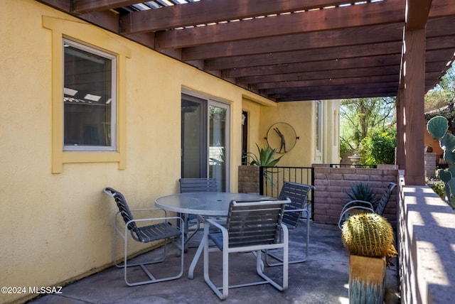 view of patio featuring a pergola