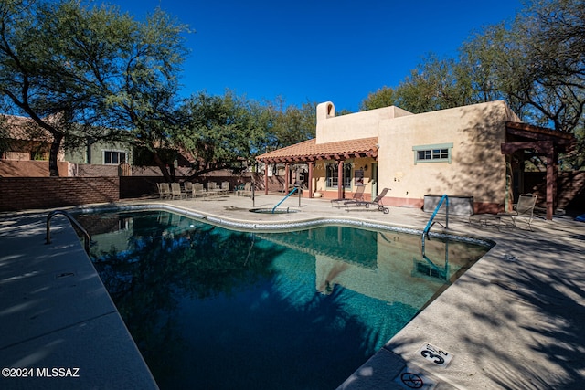 view of pool featuring a patio area