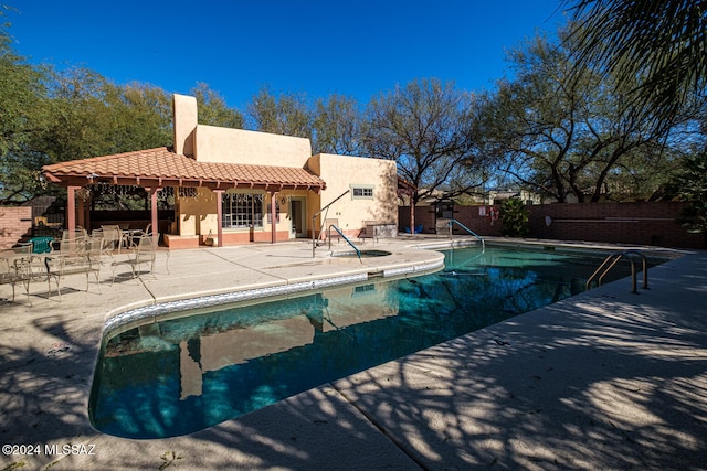 view of pool with a patio