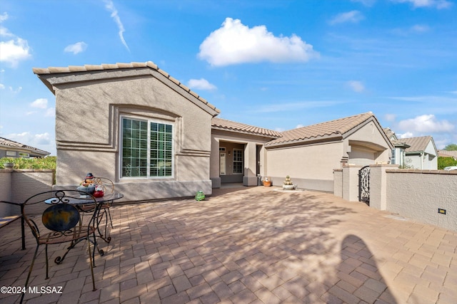 view of front of house with a patio