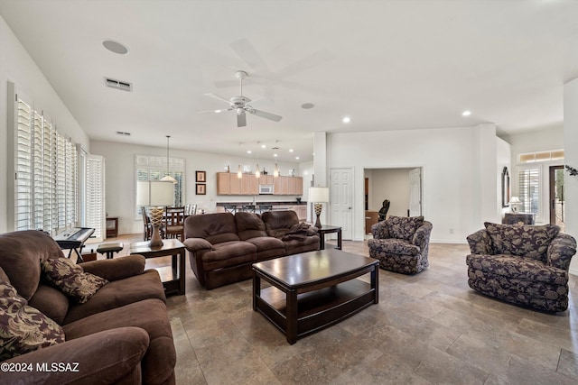 living room featuring ceiling fan