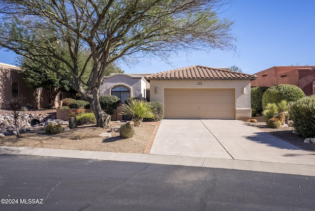 view of front of home with a garage