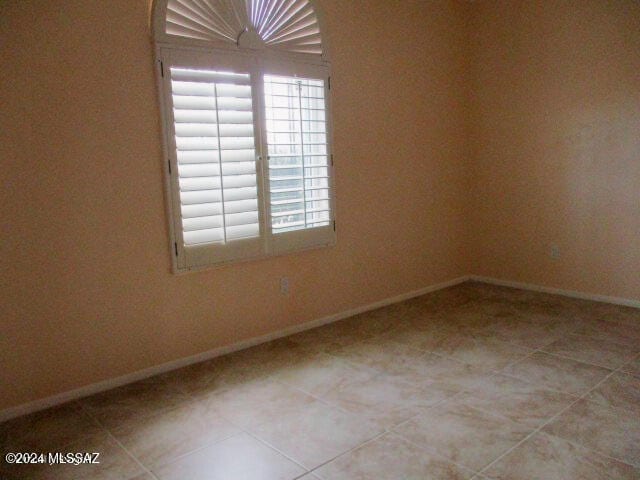 view of tiled empty room