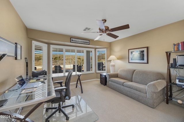 office area featuring ceiling fan and carpet floors