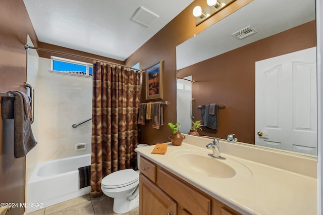 full bathroom featuring toilet, vanity, tile patterned floors, and shower / tub combo with curtain