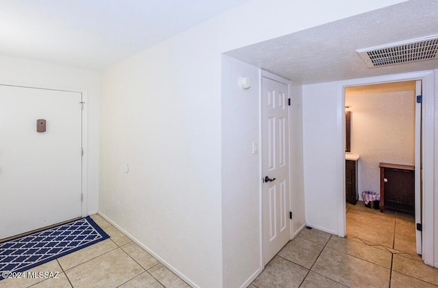 view of tiled foyer