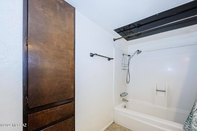 bathroom featuring shower / bath combo with shower curtain