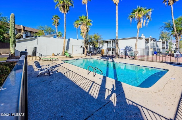 view of pool featuring a patio area