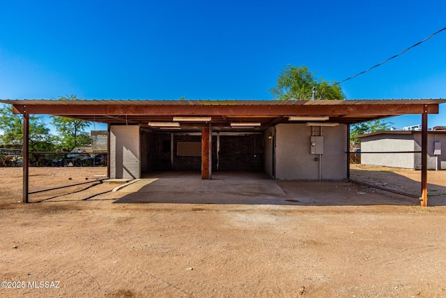 view of outbuilding with a carport