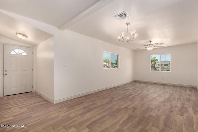 foyer featuring ceiling fan with notable chandelier, baseboards, visible vents, and light wood-style floors