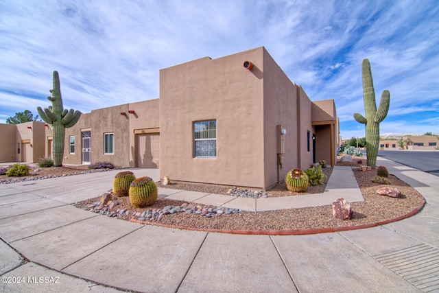 view of adobe home