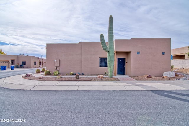 view of adobe home