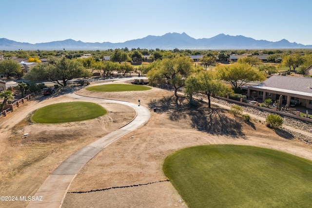 surrounding community with a mountain view