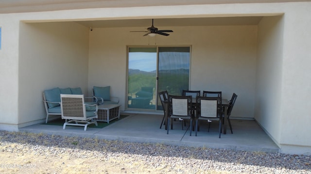 view of patio / terrace featuring ceiling fan