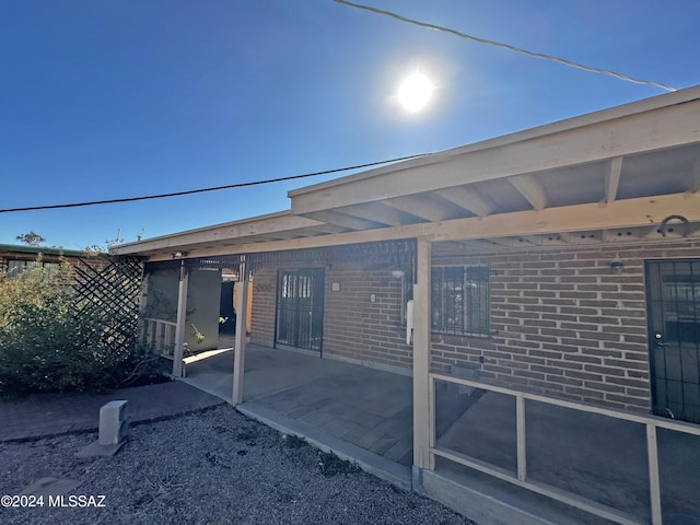 rear view of house featuring a patio area